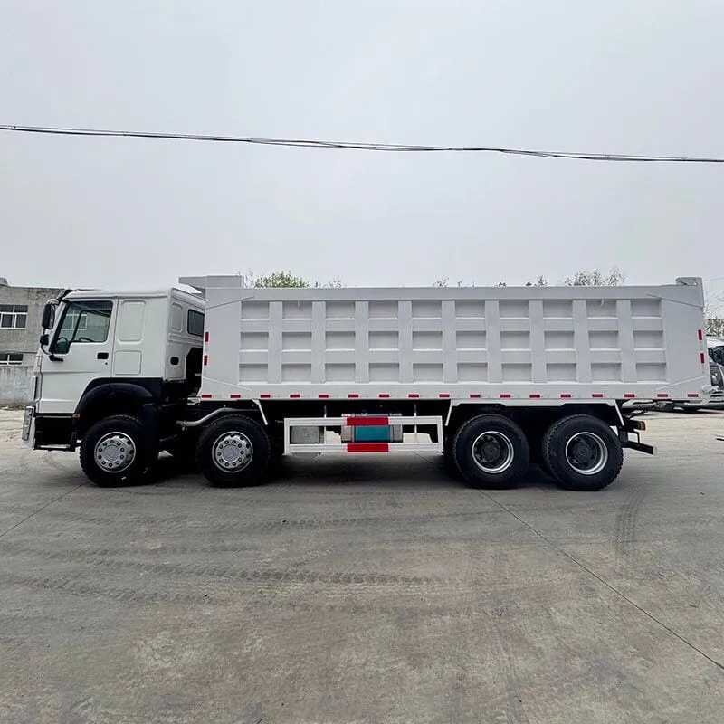 HOWO N7 8x4 dump truck showing high-roof cab and wide steel tipper body