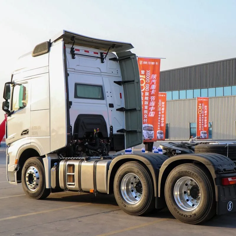SHACMAN tractor truck with semi-trailer on export ready lot